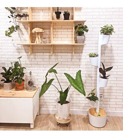 White vertical planter with 4 pots