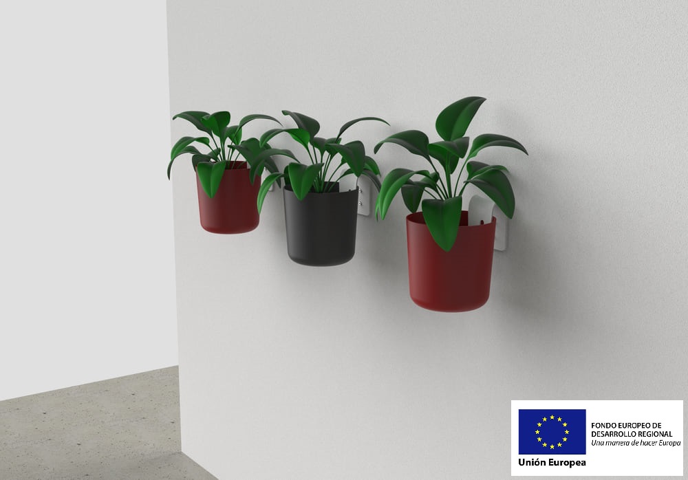Etapas iniciales del diseño del sistema de colgado de macetas en pared, mostrando los bocetos preliminares y la inspiración.